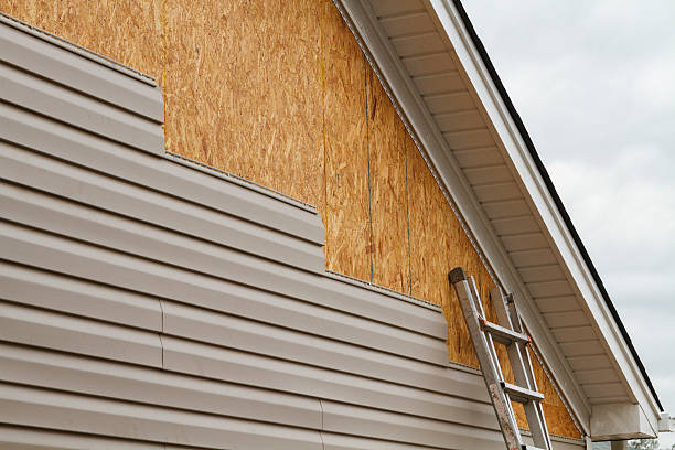 Professional Emergency Siding Repair technician working in Whitakers, NC